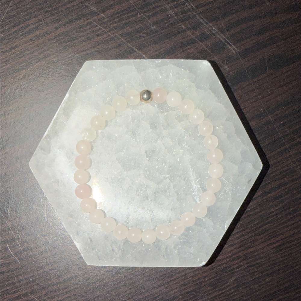 Selenite charging plate with Rose Quartz bracelt